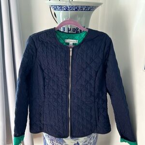 Quilted navy blue and green nylon jacket,